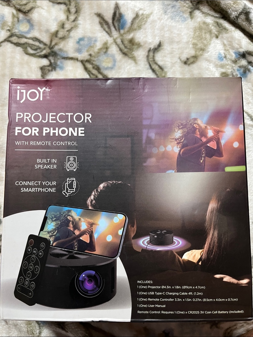 iJoy Projector for Phone - Black minus the remote.